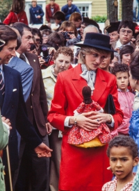 Clutching a doll, Diana is welcomed to Shelburne, NS.