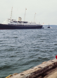 A Mountie stands guard as the Royal Yacht Britannia arrives in Charlottetown, PEI June 1983